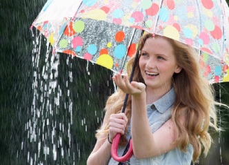 Girl With Umbrella In The Rain © Stockbrokerxtra
